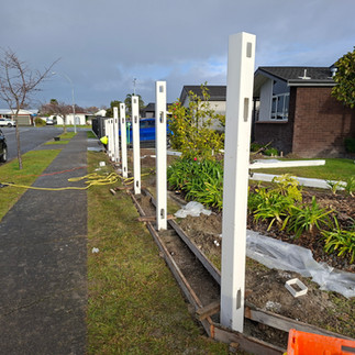 Accurate post spacing and groundwork for long-lasting PVC fencing installation.