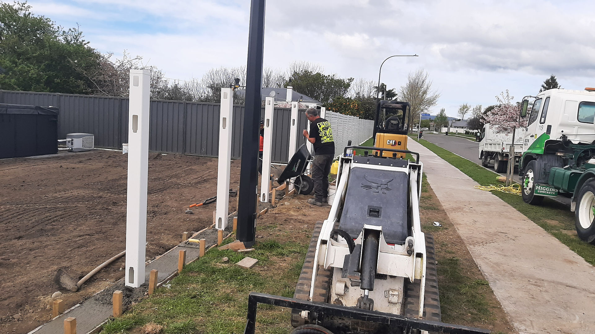 Concrete edging and boundary line prepared for PVC fencing in Hastings