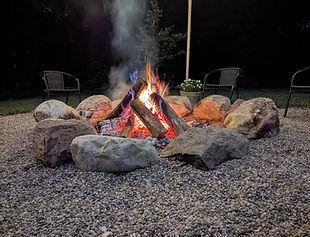 Natural Stone Fire Pit installed by Salzman Services in Berrien County MI