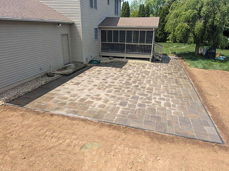 Paver patio finished by Salzman Services