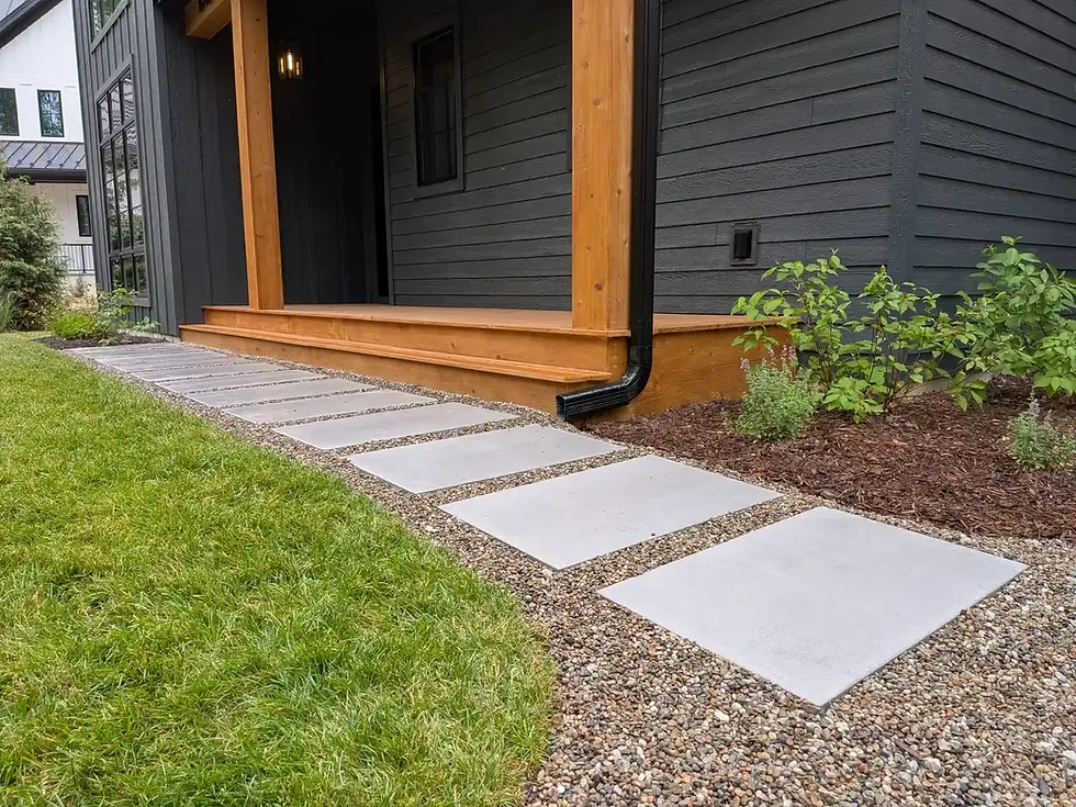 Unilock Beacon Hill Smooth XL slab walkway with pea stone joints in Union Pier, MI