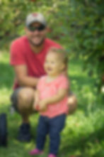 Blue Sky Daycare families explore a local apple orchard