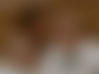 A man carries a woman in the desert