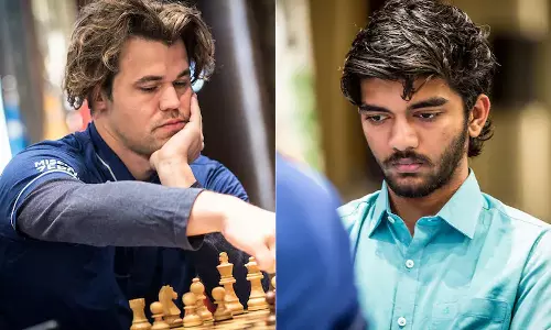 Magnes carlsen Gukesh Chess