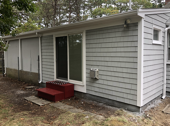 House exterior after painting D.A.M Constructions LLC