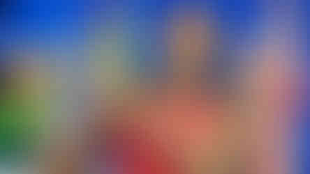 Tennis player Coco Gauff smiles while holding the US Open championship trophy in 2023