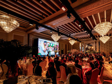 Event photographer capturing award presentation at corporate gala dinner in Dubai