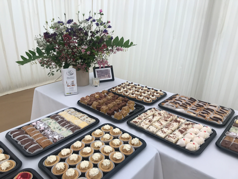 Selection of freshly prepared finger food including scones, mini cakes and sausage rolls – Farm House Treats funeral teas