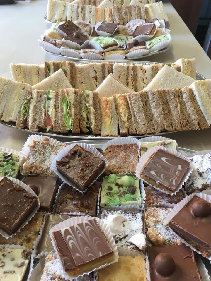 Funeral catering sandwich platters with sausage rolls and fresh cream pastries – Belfast and Lisburn funeral teas.