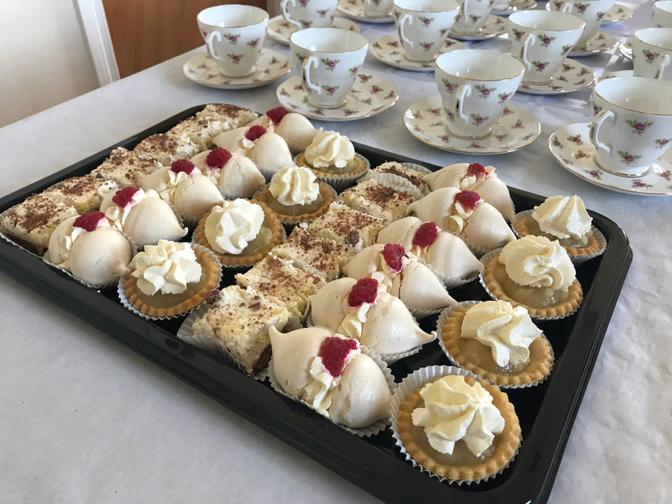Funeral catering sandwich platters with sausage rolls and fresh cream pastries – Belfast and Lisburn funeral teas.