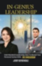 2 smiling and successful business professionals. In their high rise office, the sun is shining through the window and an enneagram wheel