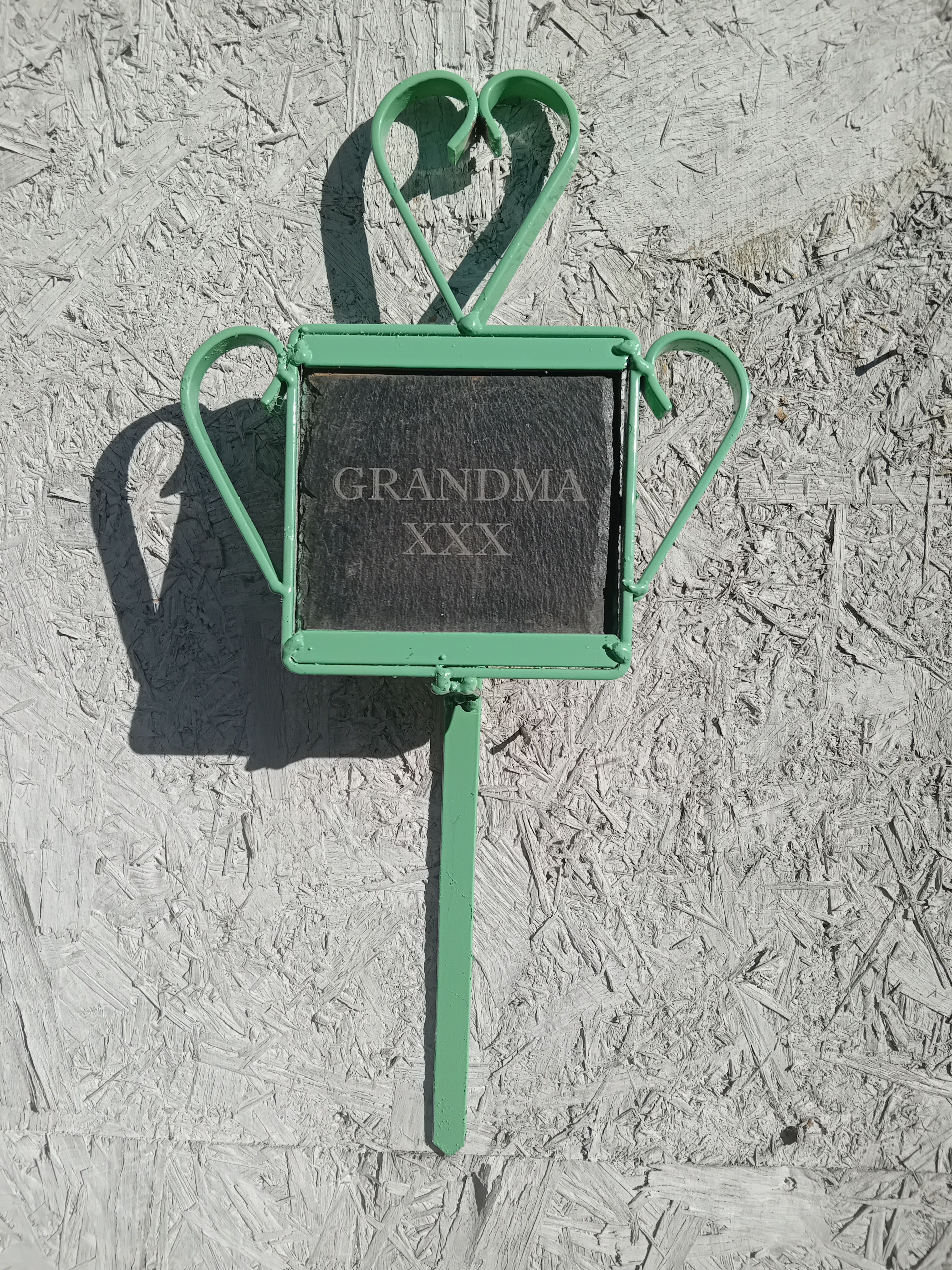 A Memorial 4" Square Slate with GRANDMA XXX on Stake Planter in Light Green.