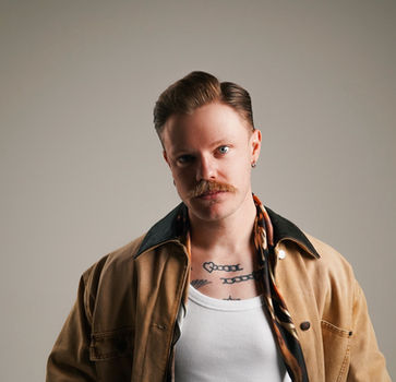 Slick side-part haircut and moustache, styled by Ikigai Barbers in Melbourne.