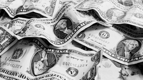 Crumpled U.S. dollar bills symbolizing capital markets, investor engagement, and financial growth opportunities