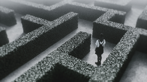 Woman standing in a foggy green maze, symbolizing confusion and obstacles. Represents small-cap companies navigating SEO and visibility challenges.