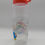 Thumbnail: Sanrio Glitter Water Bottle with Red Lid – Rainbow Design