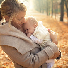 mother and baby at naming ceremony