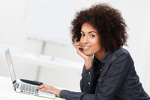 Woman with laptop at home for online therapy in Missouri with a licensed online counselor in Missouri. St. Louis based Marble Wellness provides online counseling in Missouri for depression, anxiety, mothers, and more. Online therapy for women in Missouri is here for you!
