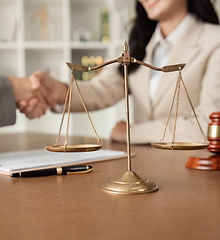 a-lawyer-and-a-businesswoman-shake-hands-and-reach-2025-01-16-13-14-00-utc.jpg