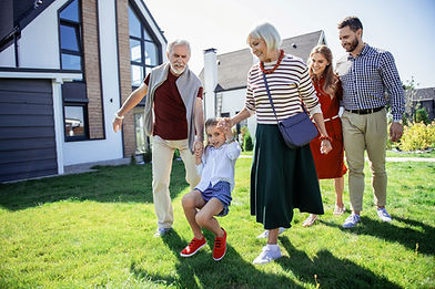 Multi-generational family celebrating setting up a Trust.