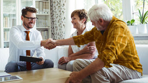 Senior couple learning about the benefits of a trust