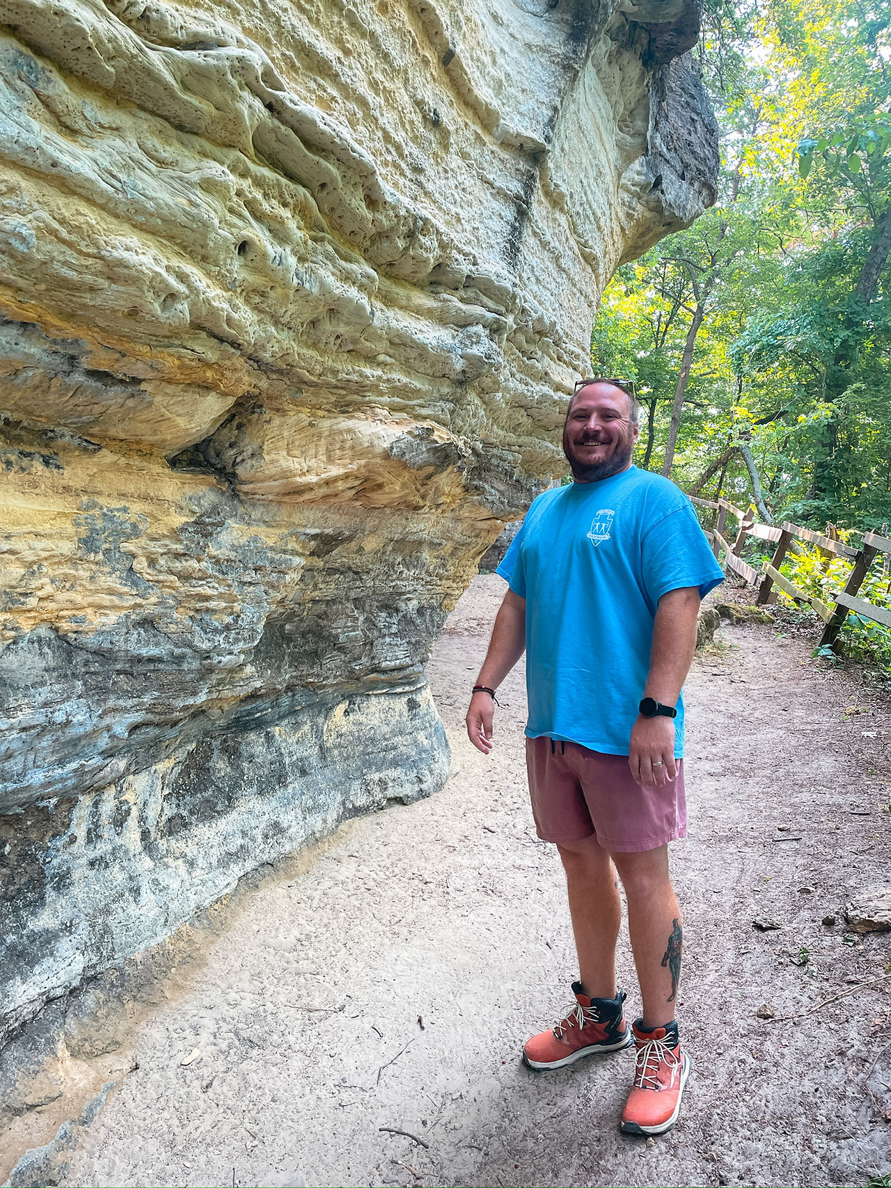 man by Tower Hill State Park sandstone