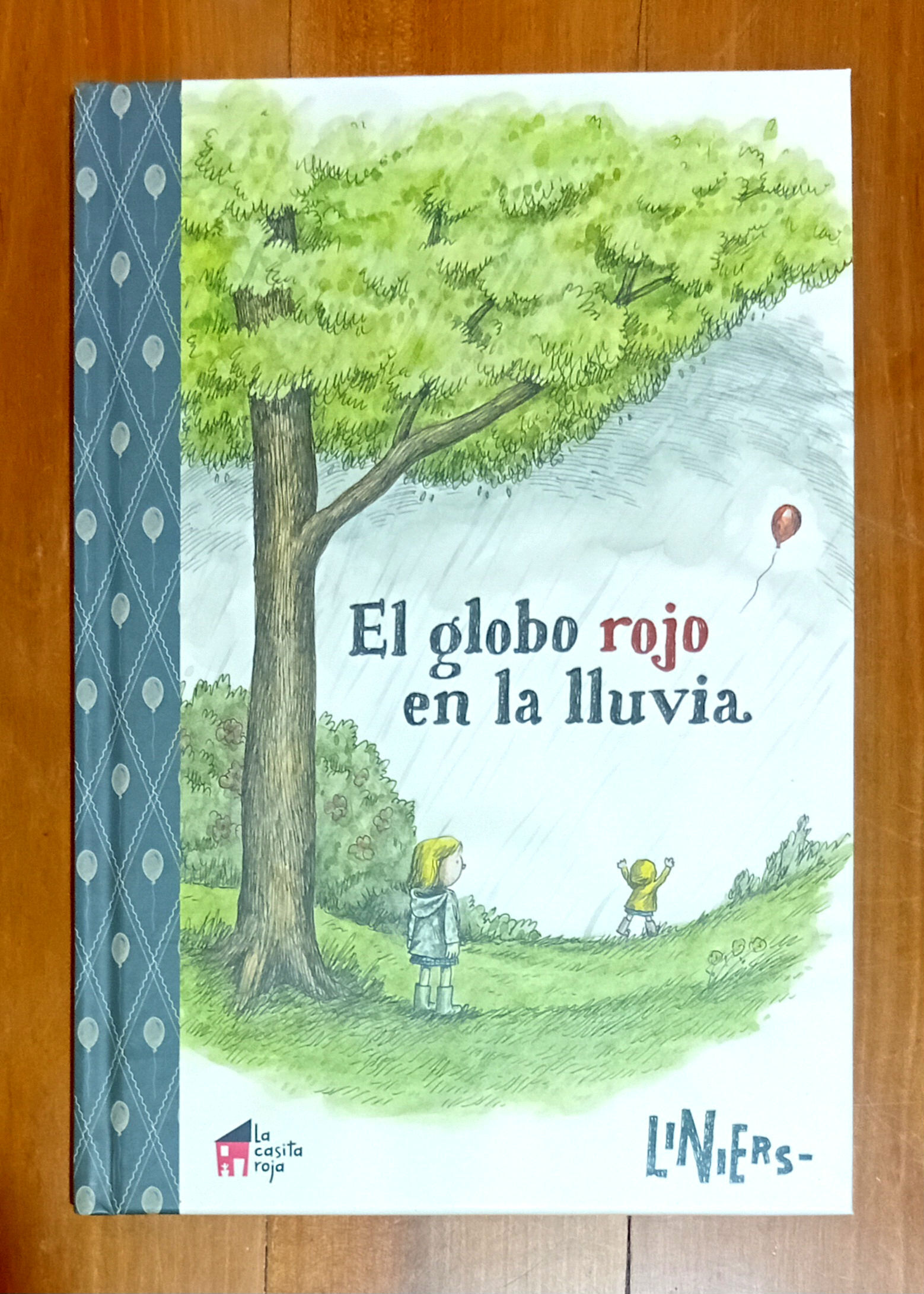 EL GLOBO ROJO EN LA LLUVIA | Liniers | La casita roja