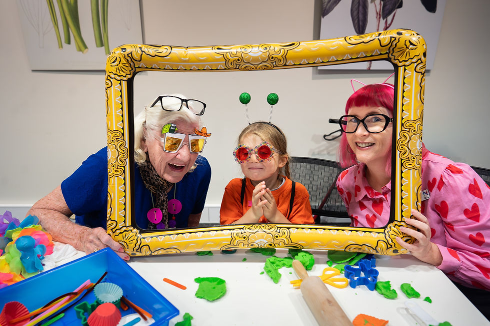 From L-R: Aged care resident Mary and Merindah preschooler Laine join Newcastle Libraries Head of Service Delivery Mala Scorse for the final Little and Wise session at Wallsend Library.
