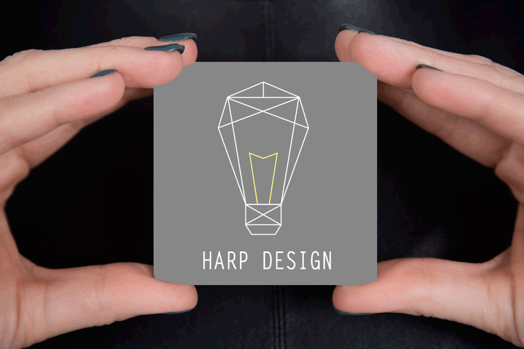 Hand with Business Card Harp Design1.png