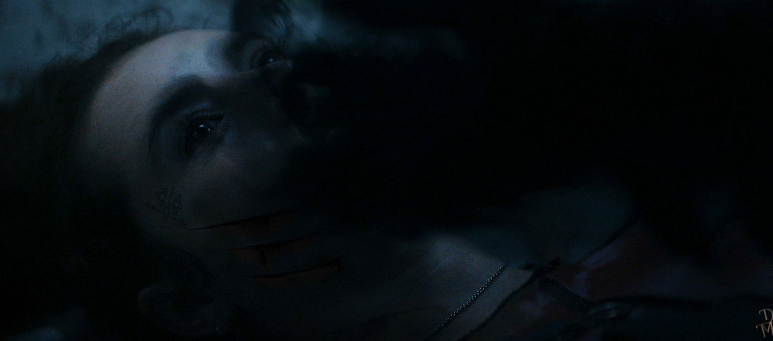 Fern (Bibi Stevens) being crushed by the demon