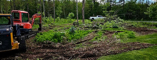 Forest site excavation by North of 12 Contracting using orange excavator, Bobcat, and company truck, earthworks services in Victoria Harbour, Midland, Simcoe County, Georgian Bay & Muskoka
