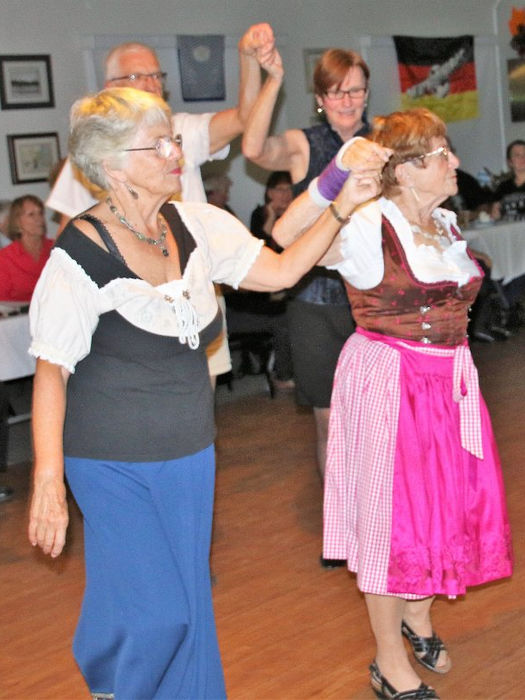 seniors dancing at the Oktoberfest event