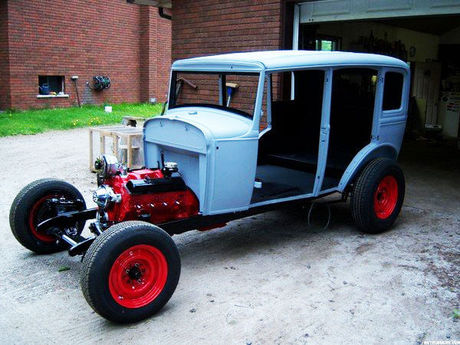 Photos of Matthew Taylor rebuilding a 1931 Ford Slant Window 