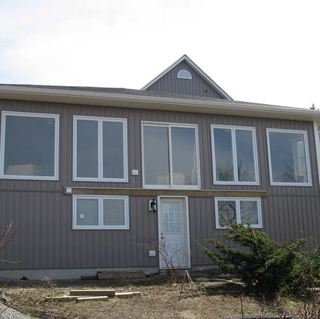 Lipton Addition Project - back of home with multiple large windows