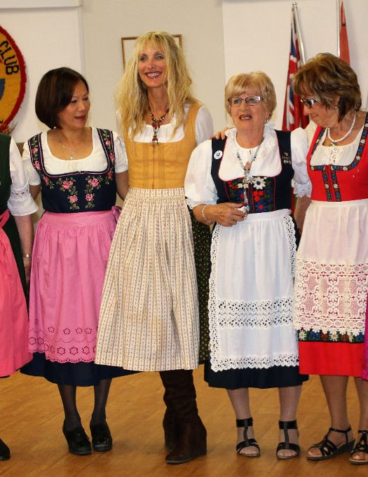 volunteers in Oktoberfest outfits