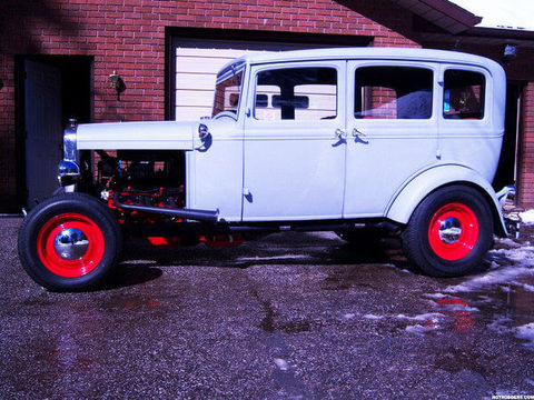 TT Garage Classic & Custom Car Specialists White Ford Slant Window with Red Rims