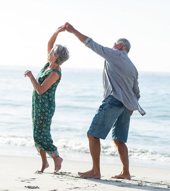 Seniors Dancing on Beach