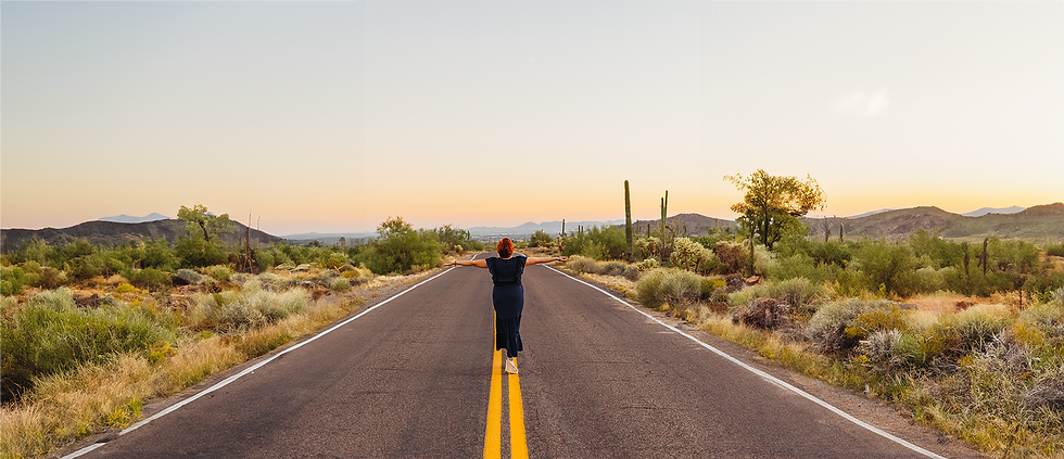 Amy Walking Down Centre of Desert Road