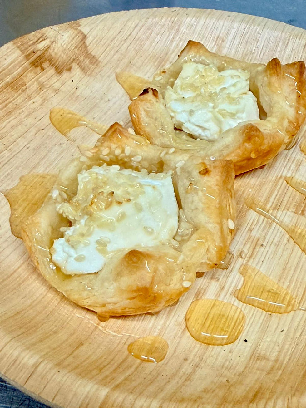 canapes Manouri cheese pastry bites with Honey and sesame