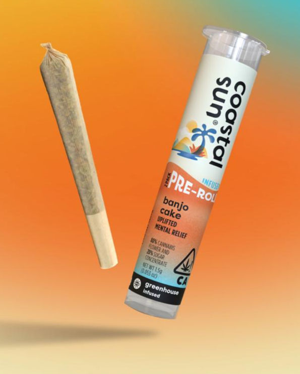 Coastal Sun infused pre-roll Banjo Cake tube and pre-roll floating over orange, yellow, and turquoise gradient
