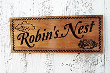 a custom sign with little birds