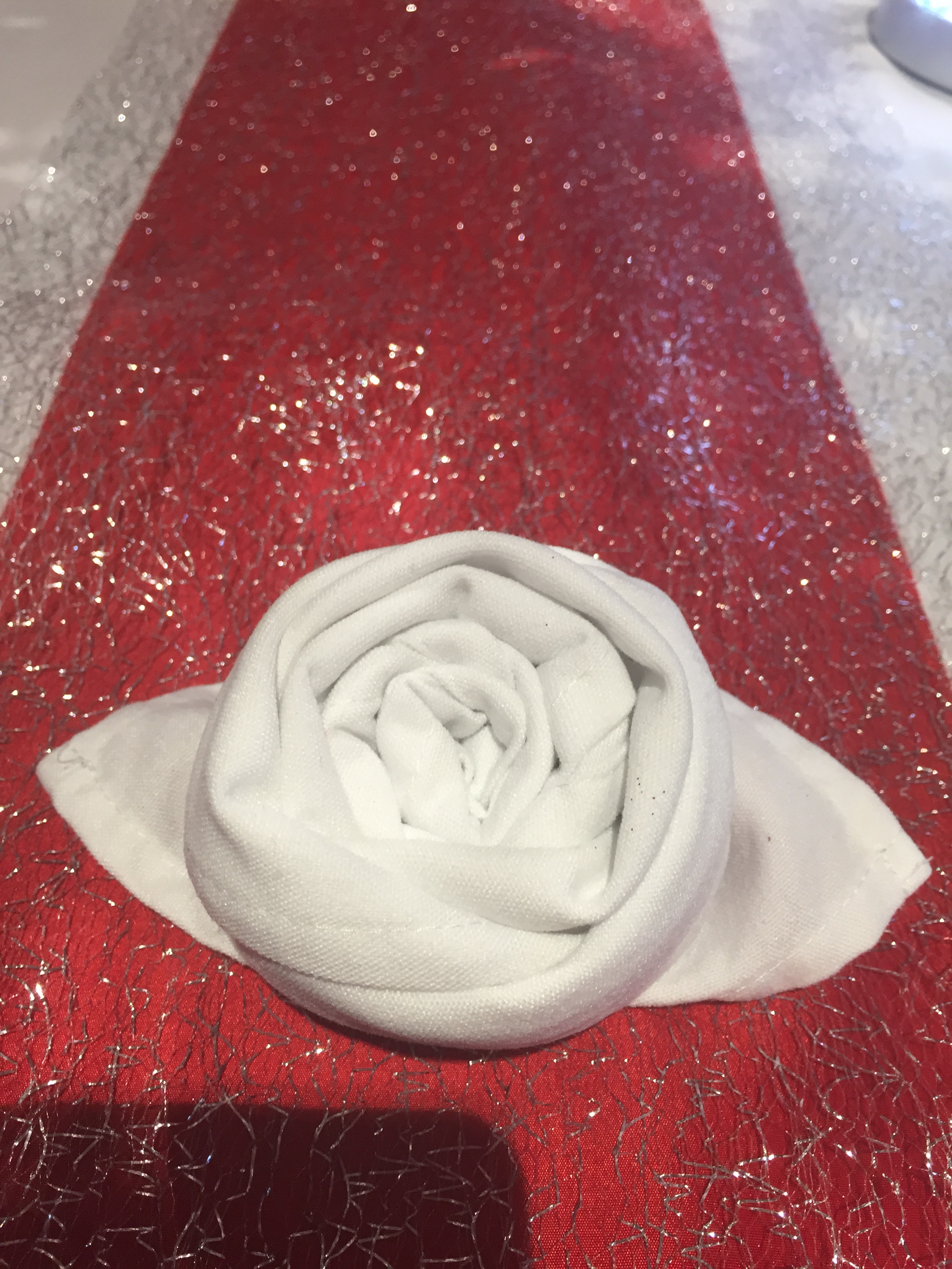 Rose napkin fold white