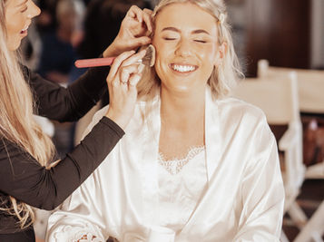 Bride in Makeup chair sw wedding films
