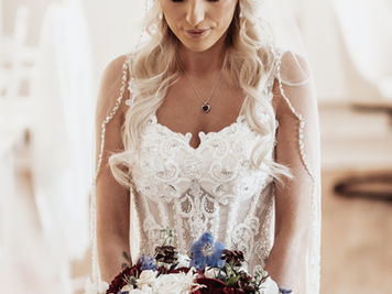 bride looking at flowers