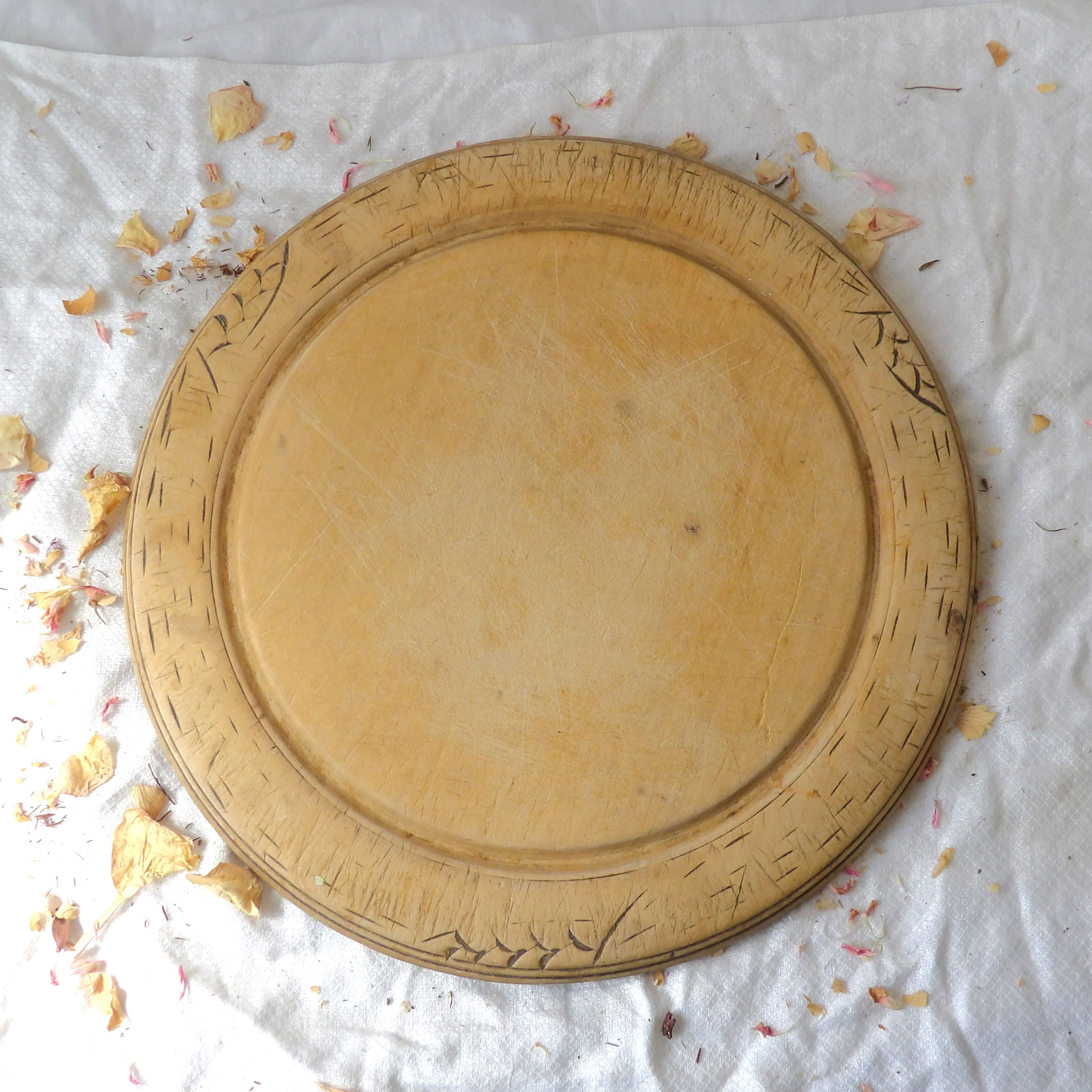 vintage bread board with carved rim