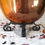 Thumbnail: Antique copper helmet shaped coal bucket in wrought iron feet