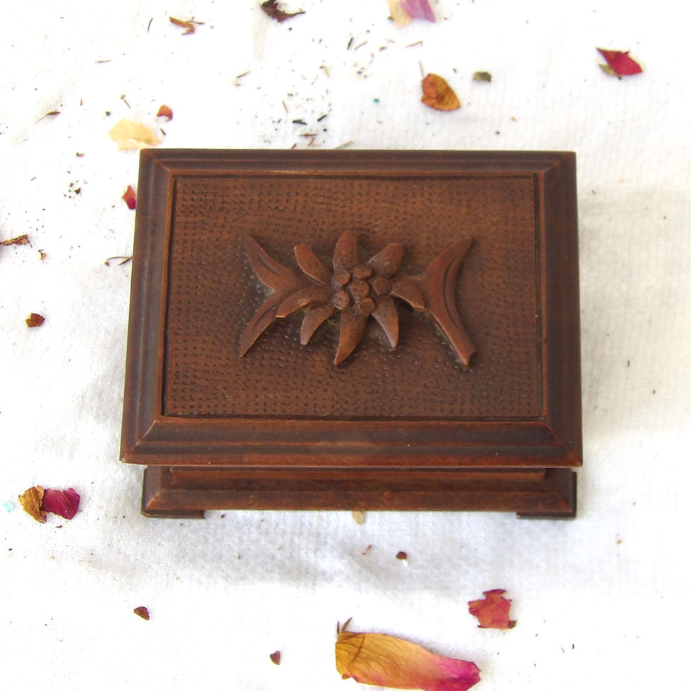 Miniature vintage wooden box with flower motif
