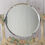 Thumbnail: round vintage Barbola vanity mirror on stand