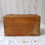 Thumbnail: vintage wooden equipment box with front clasps