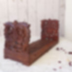 vintage carved wooden extending bookshelf with flowers